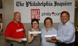 Brian Tierney, CEO of Philadelphia Media Holdings, with the happy winners of our Billy Joel / Elton John tickets giveaway, in July, 2009.